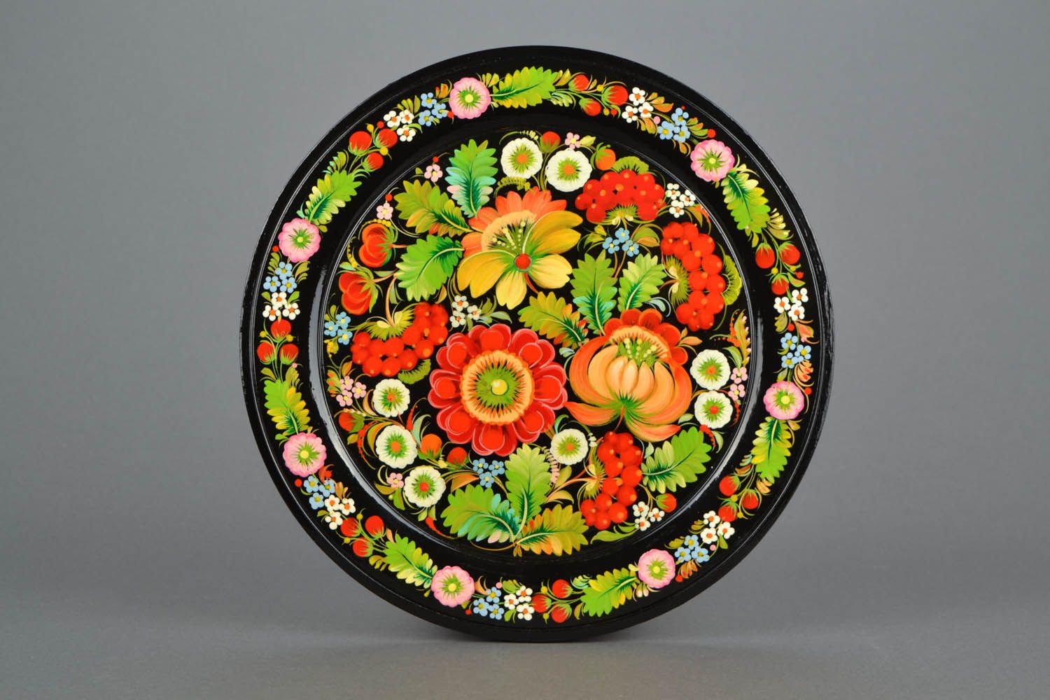 Decorative plate with Petrikov painting photo 1