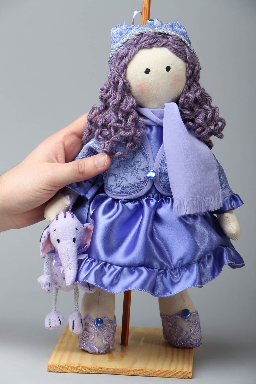 Fabric doll with a stand photo 4