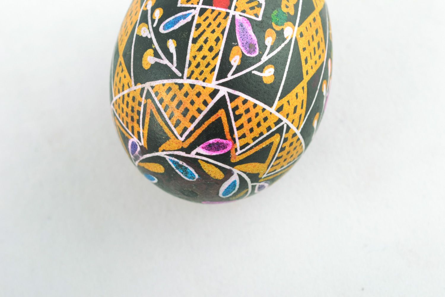 Handmade painted Easter egg pysanka with rich ornament made with hot wax  photo 3