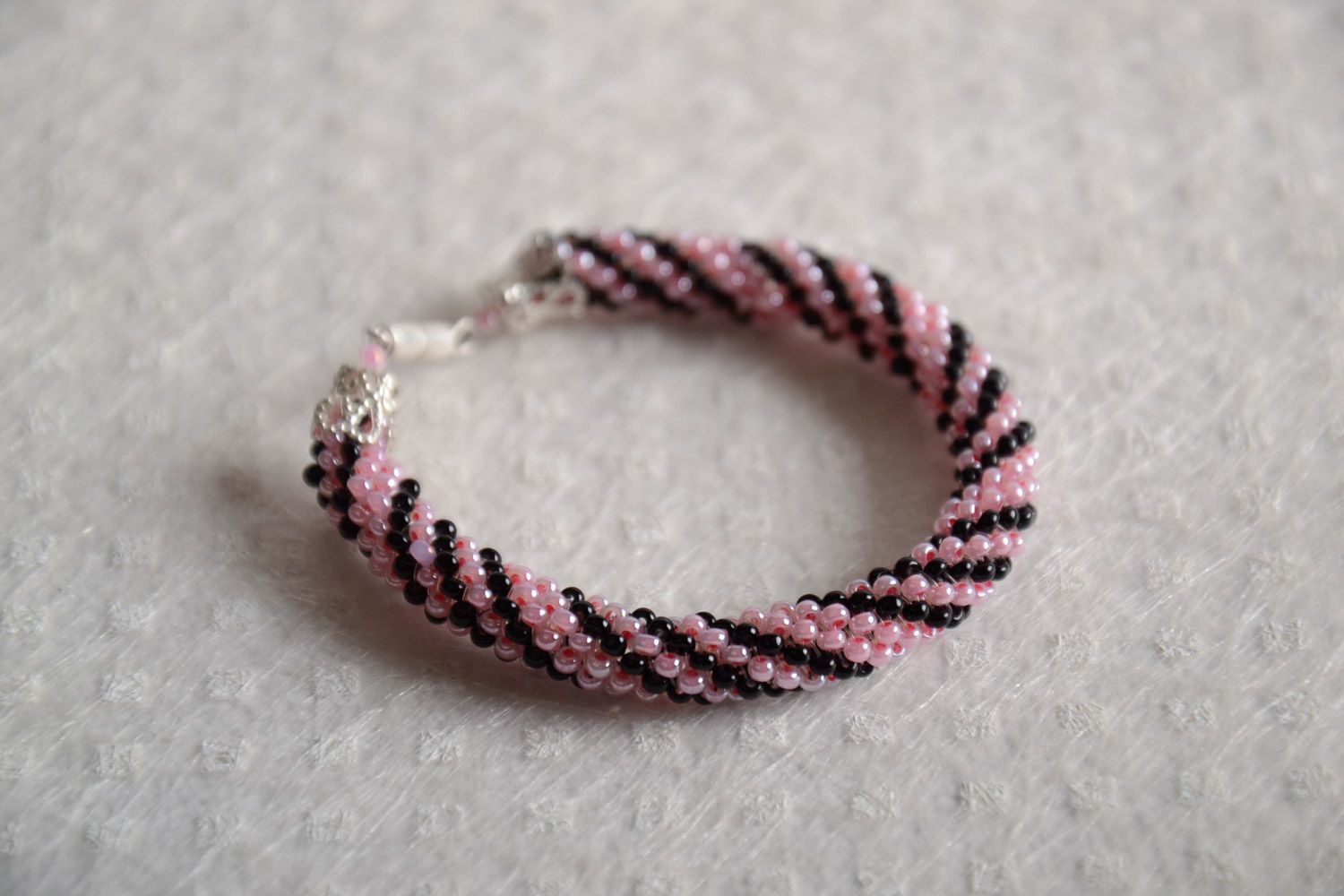 Beautiful women's handmade wrist bracelet woven of Czech beads of two colors photo 1