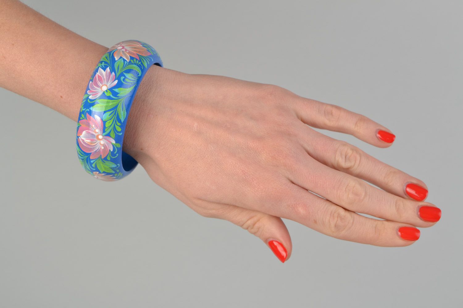 One-piece handmade wooden bracelet with Petrikov painting blue with flowers photo 2