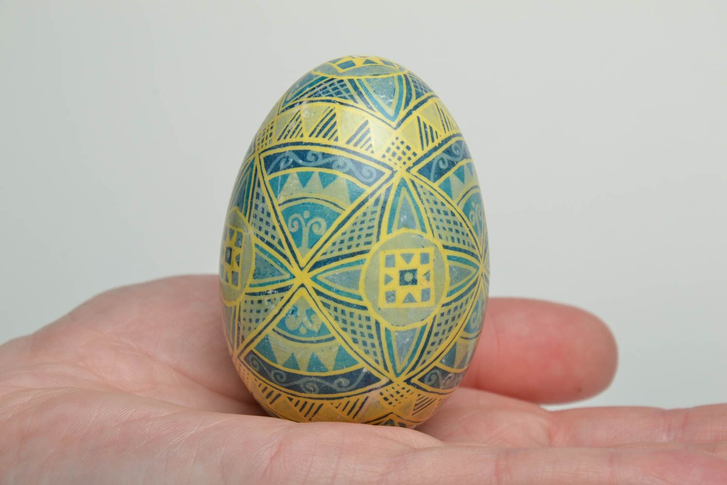 Easter egg with traditional symbolics painted with aniline dyes photo 5