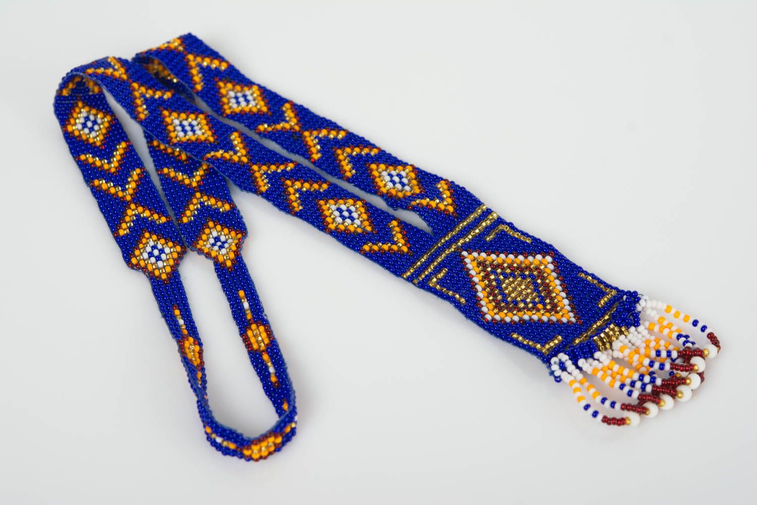Collar hecho a mano de abalorios de estilo étnico artesanal largo de color azul foto 1