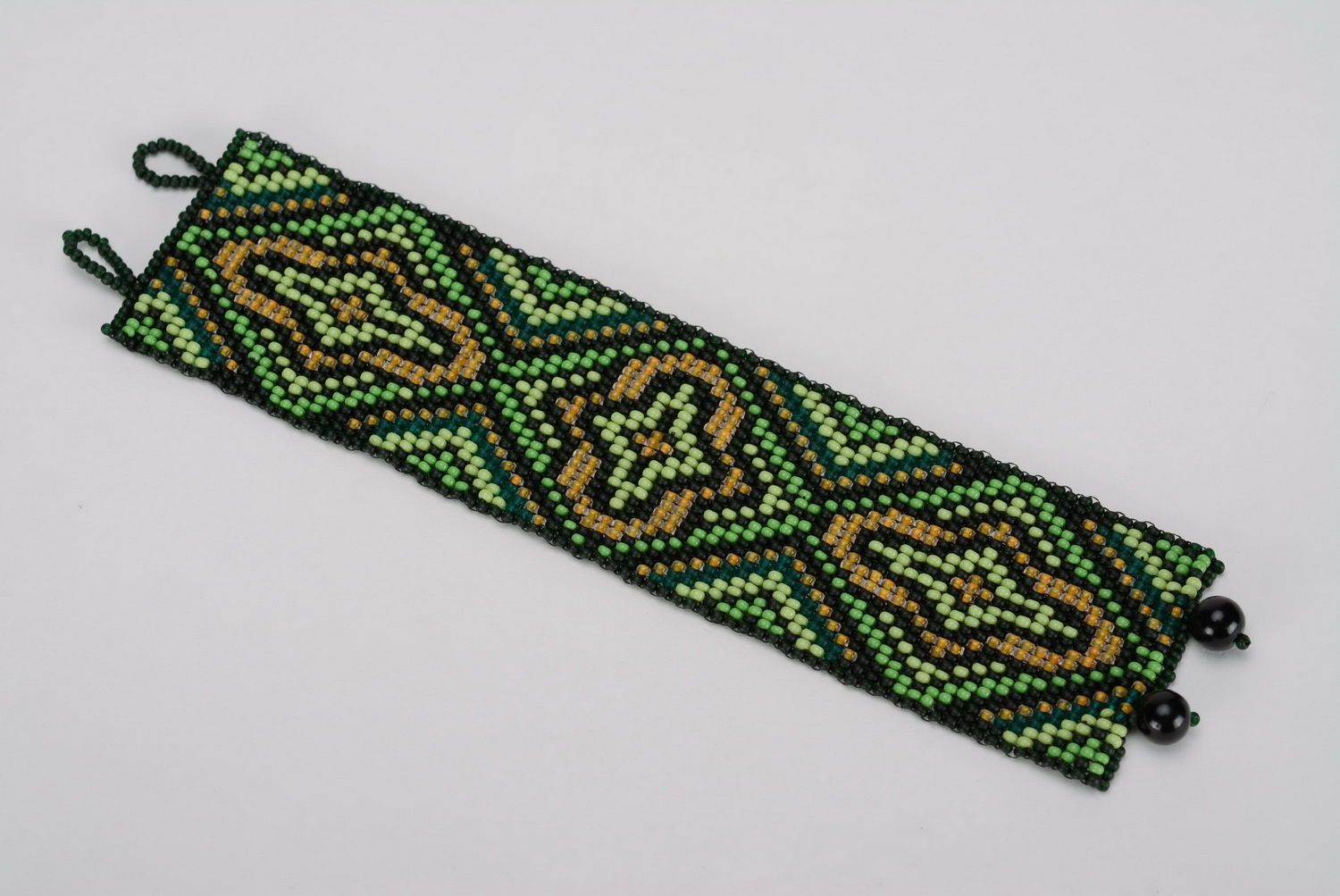 Wide ethnic beaded bracelet dark green and black yellow bracelet photo 1