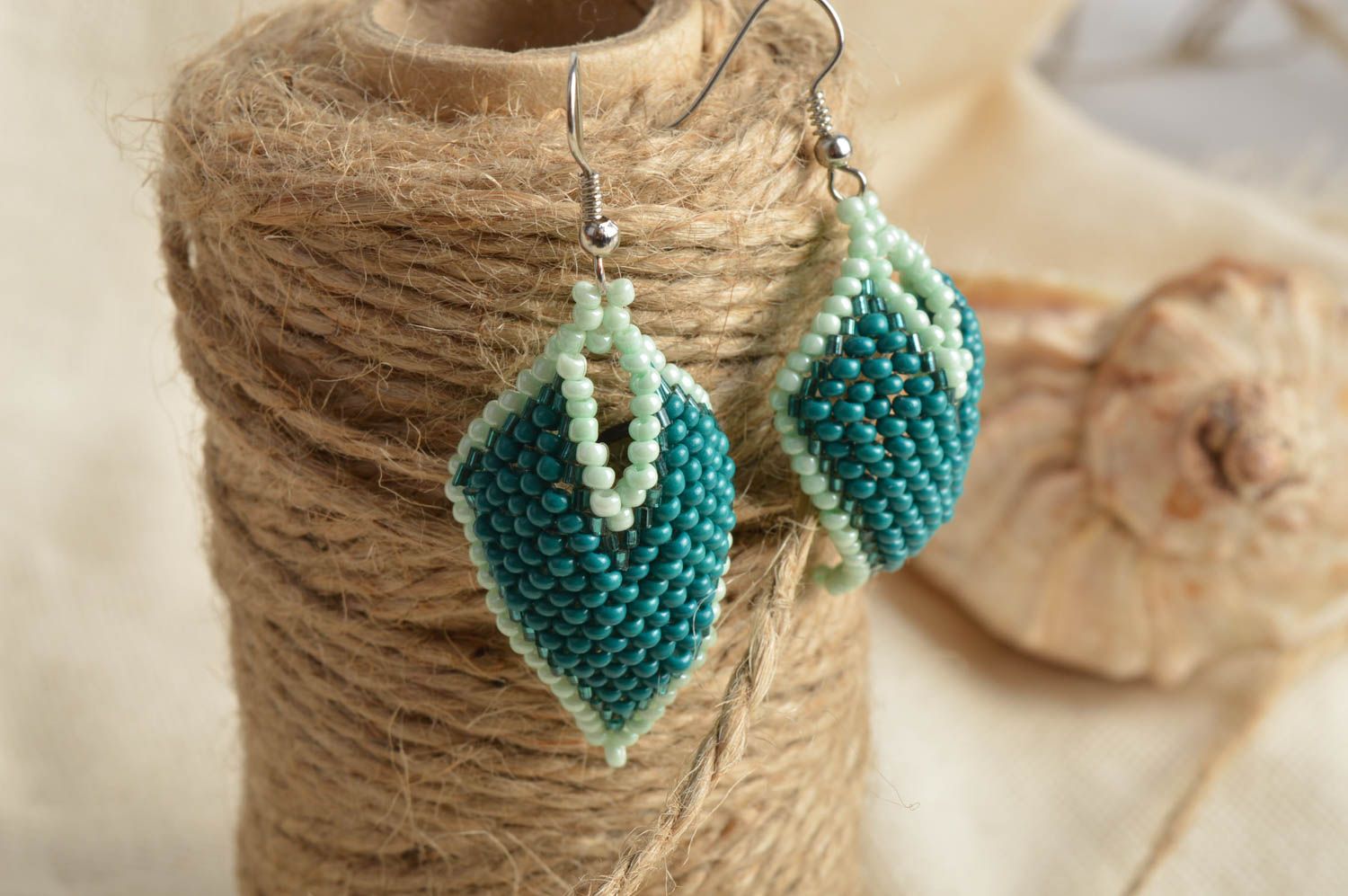 Handmade designer bead woven earrings of turquoise color of rhombus shape photo 1