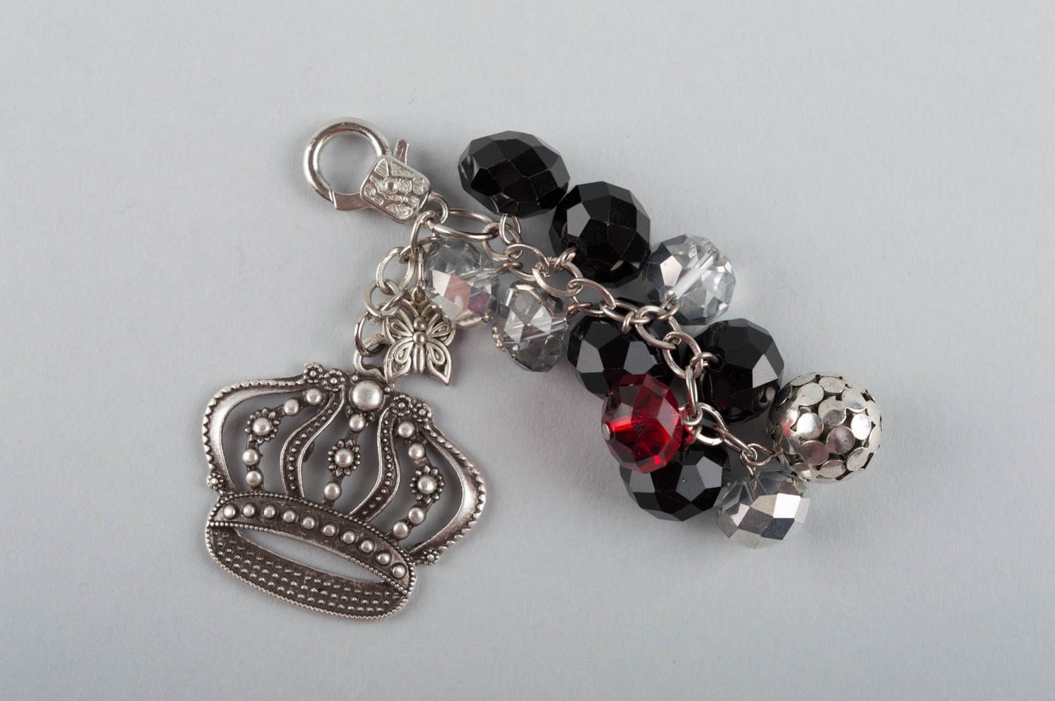 Handmade keychain made of glass beads with charm in shape of crown for girls photo 1