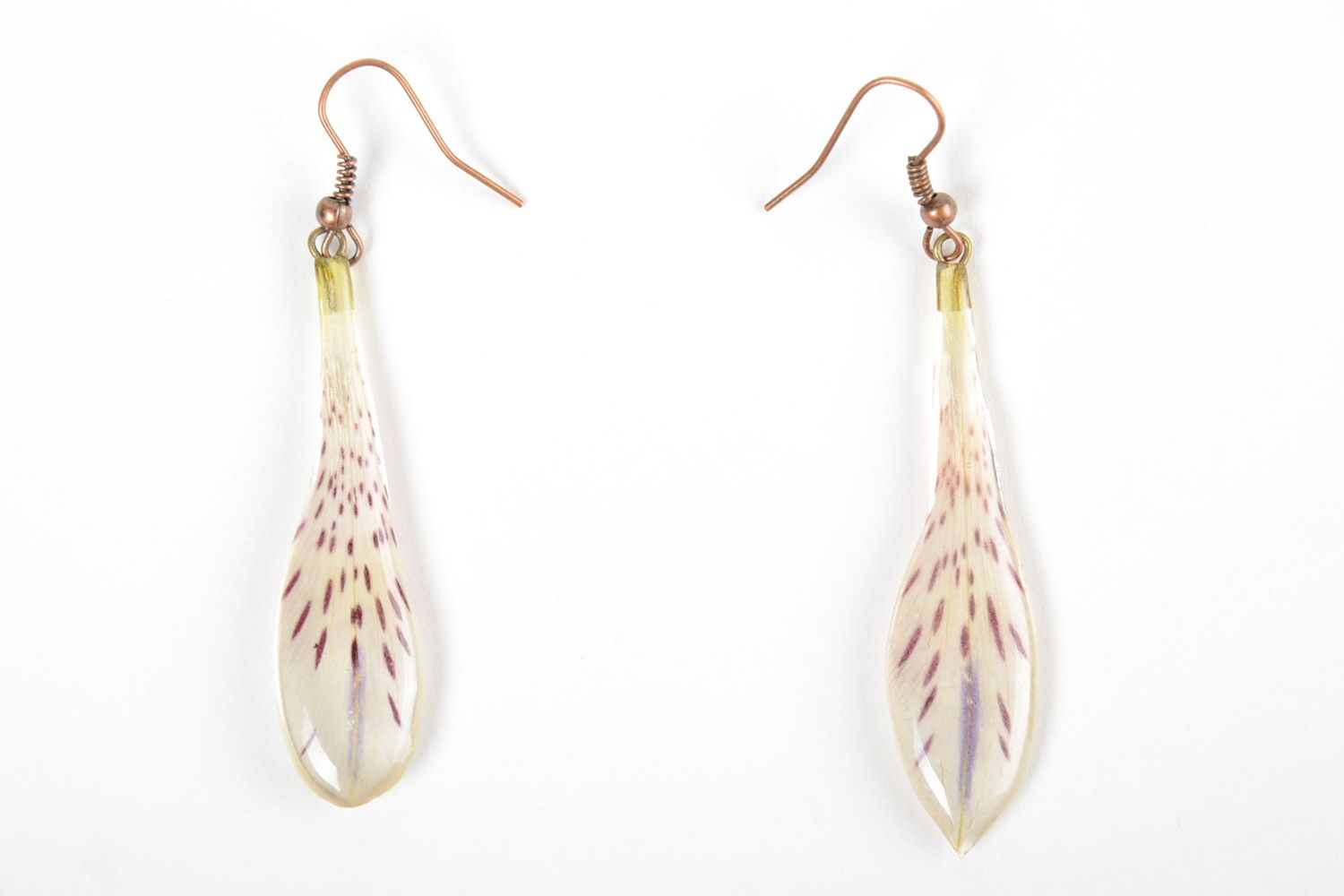 Handmade tender drop-shaped dangling earrings with natural flowers in epoxy resin photo 3