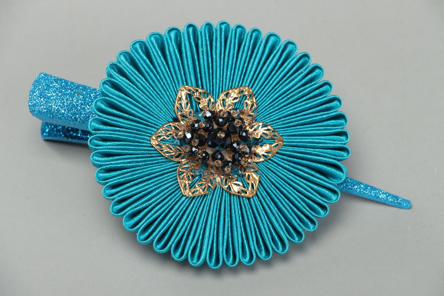 Bright handmade hair clip with kanzashi flower created of blue satin ribbons photo 1