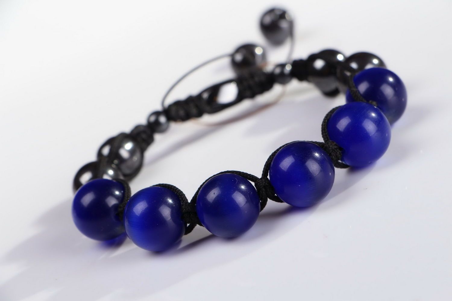 Bracelet en perles œil de chat bleues et hématite photo 3