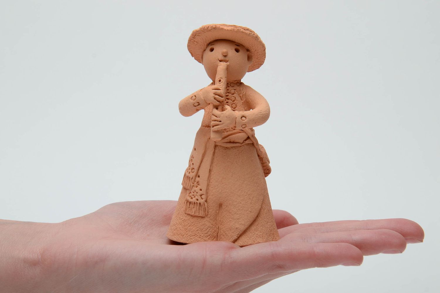 Statuetta musicista in argilla fatta a mano figurina decorativa in ceramica 
 foto 5