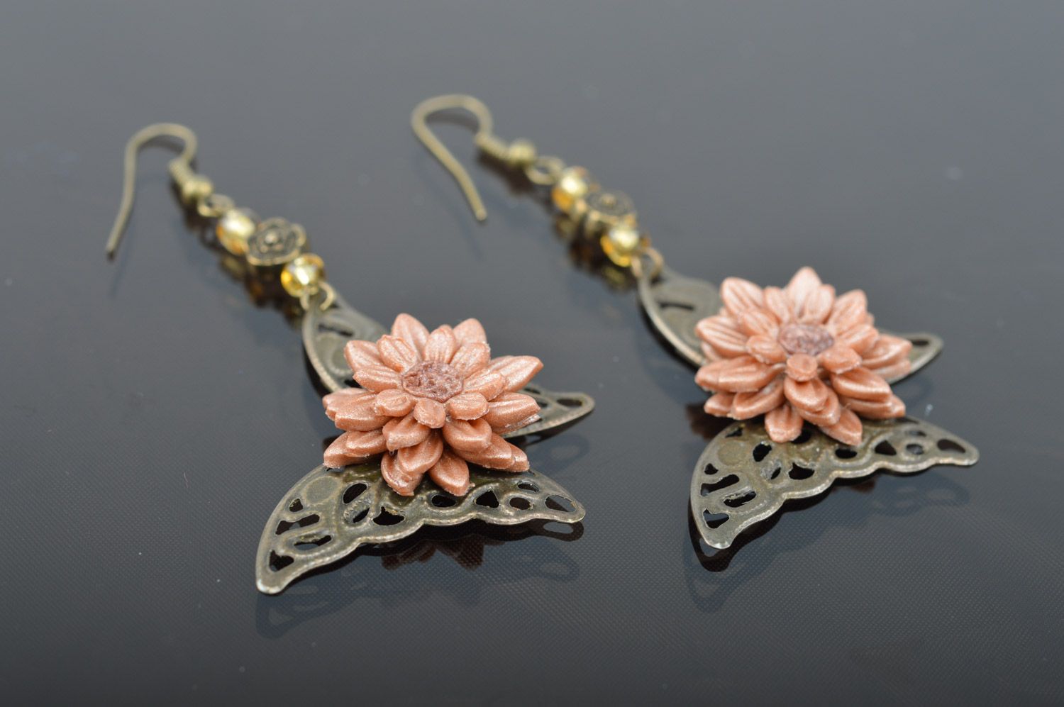 Dangle earrings hand made of metal and polymer clay in the shape of butterflies and flowers photo 4