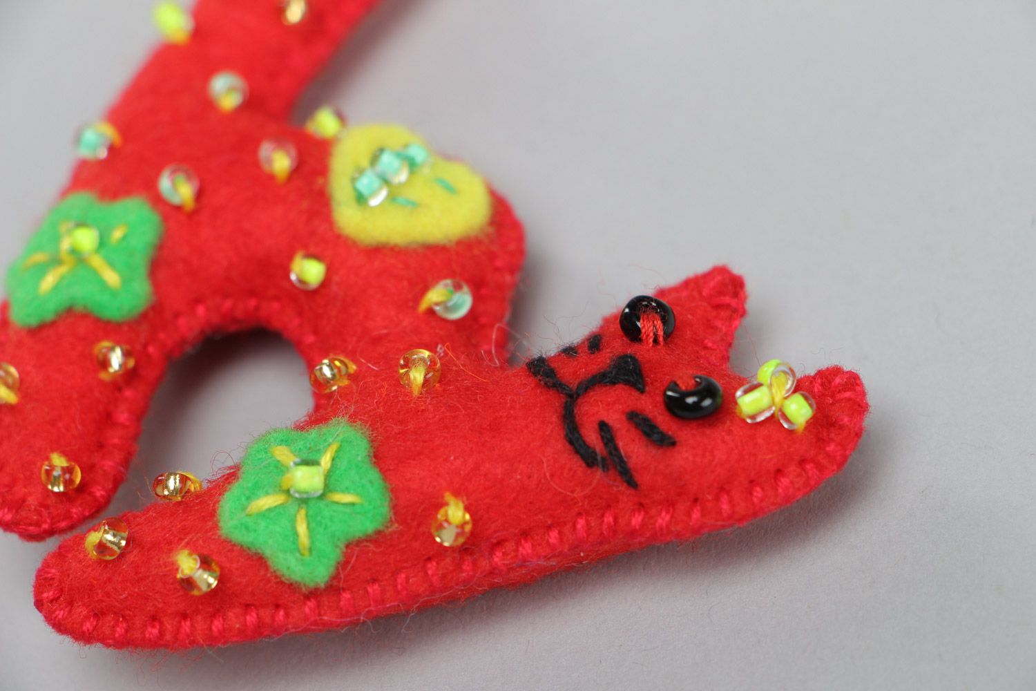 Bright red handmade soft toy kitten sewn of felt for decor of child's room  photo 3