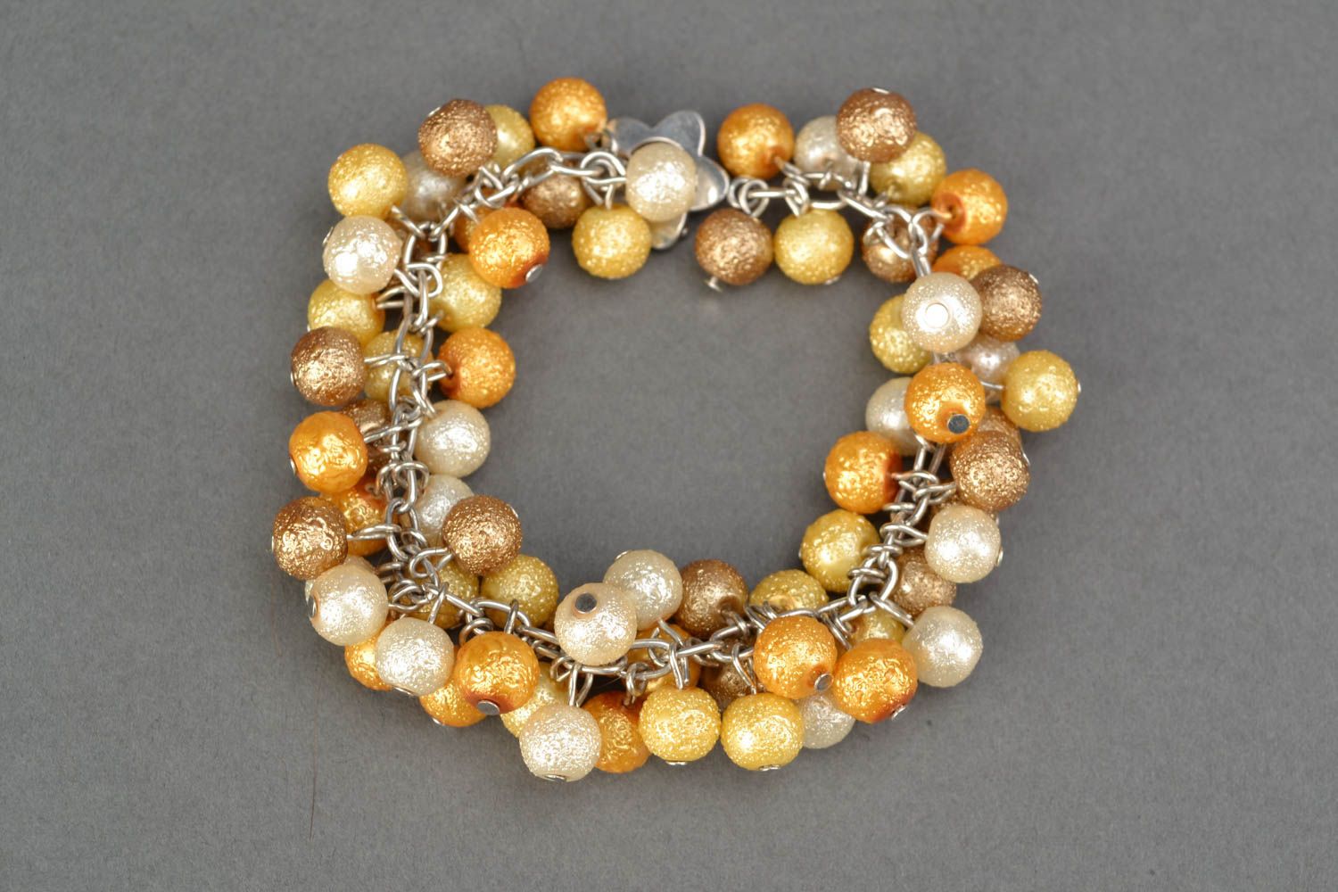 Boucles d'oreilles et bracelet artisanaux de perles fantaisie photo 4