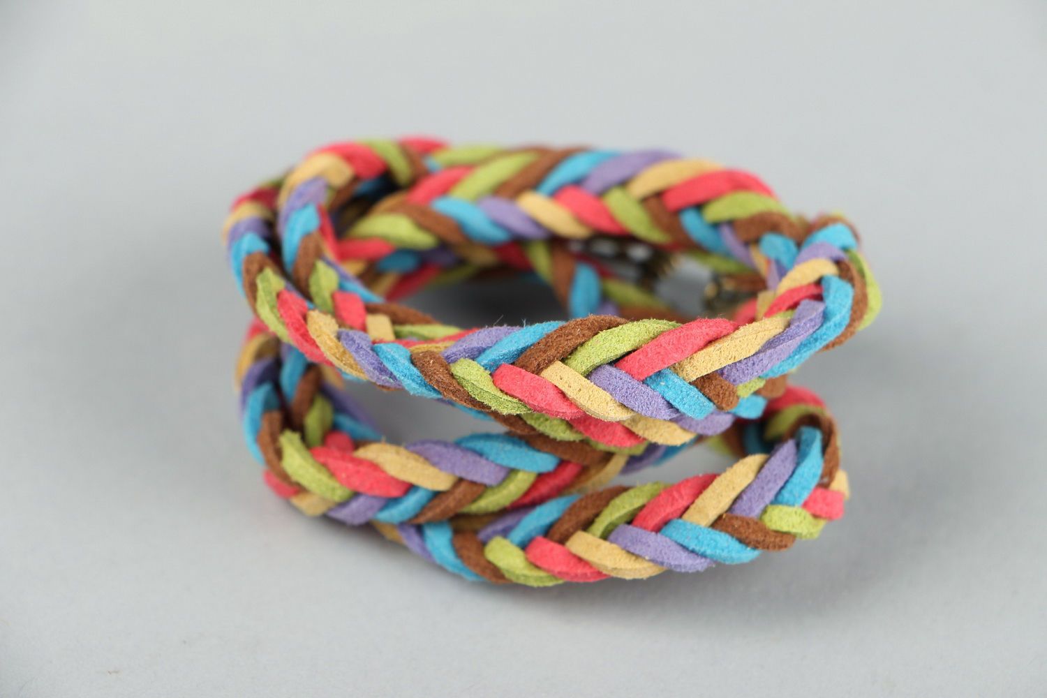 Bright braided bracelet made of suede photo 1