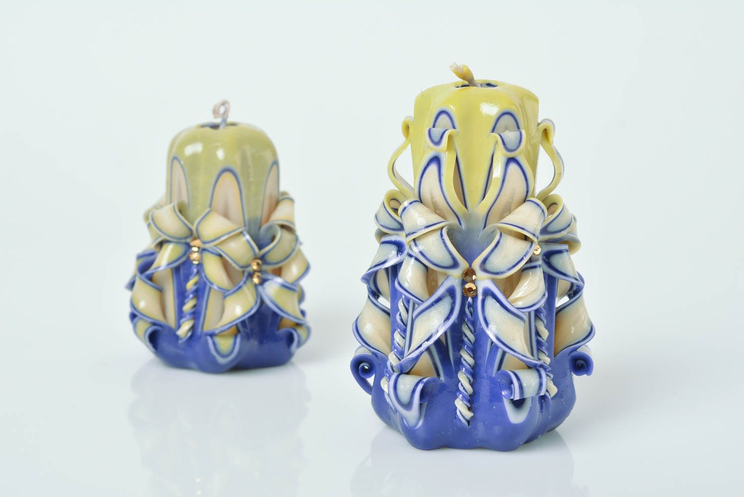 Blue and yellow handmade beautiful carved paraffin candle photo 5