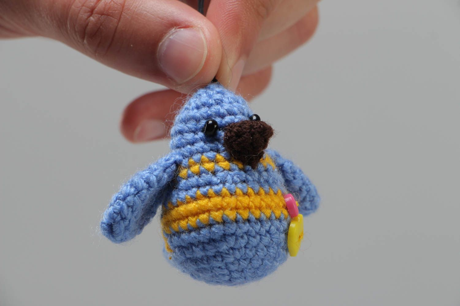 Handmade small soft toy keychain crocheted of acrylic threads blue yellow bird photo 5