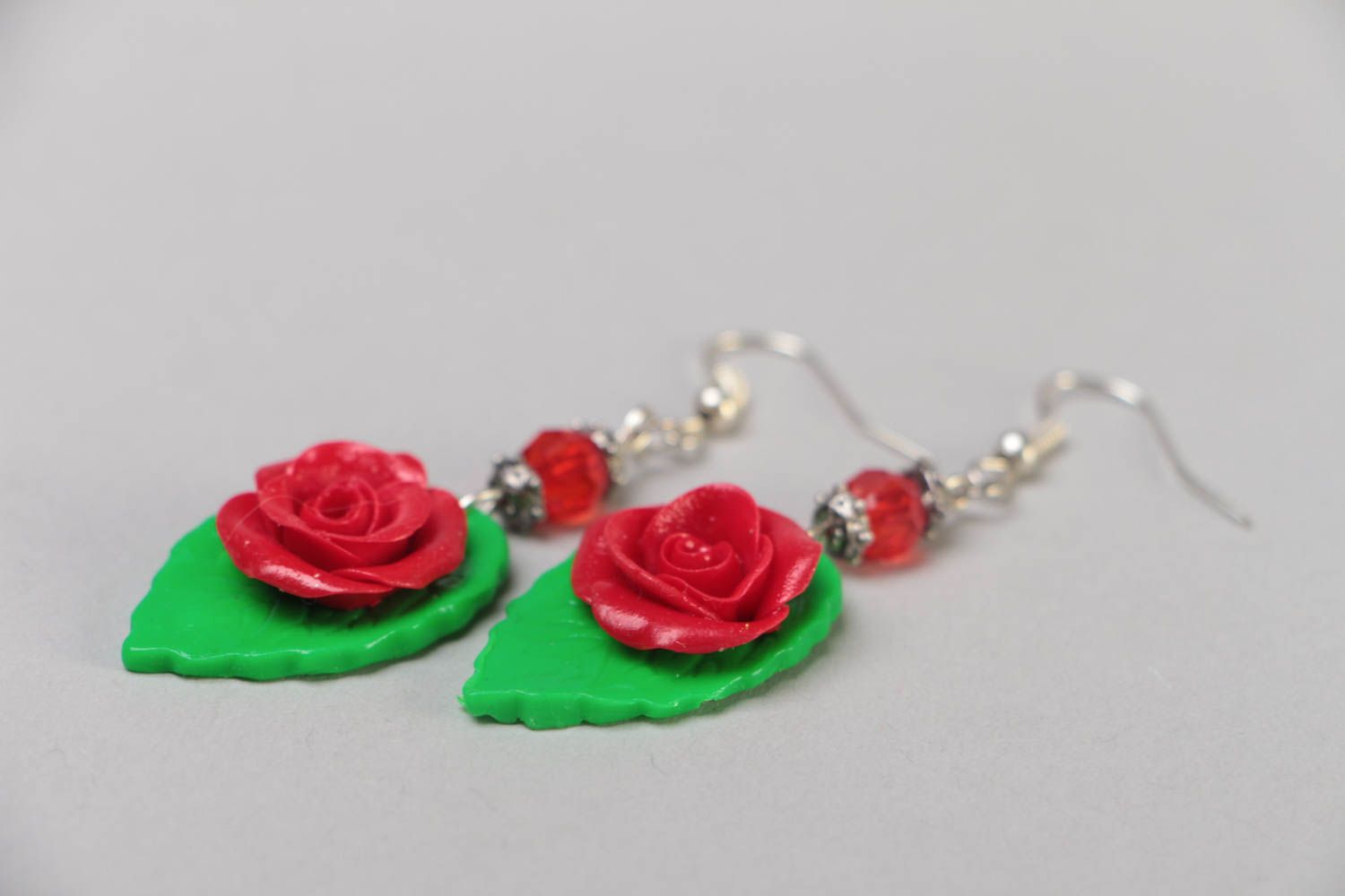 Handmade designer festive polymer clay dangling earrings with red flowers  photo 3