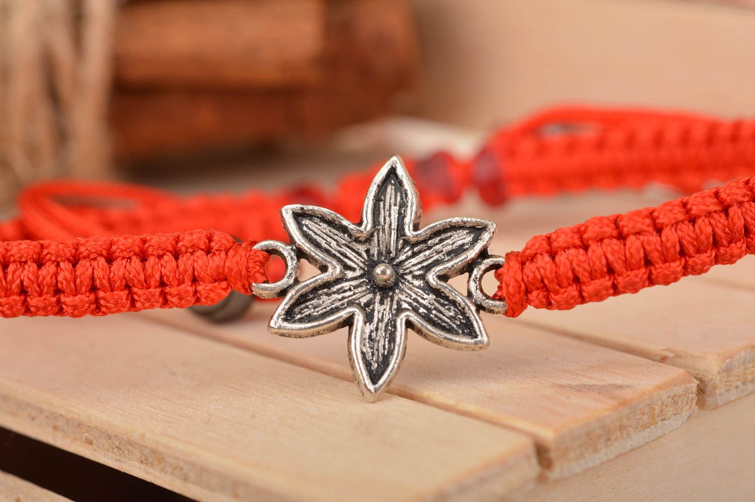 Beautiful red handmade design bracelet woven of silk threads with insert Flower photo 1