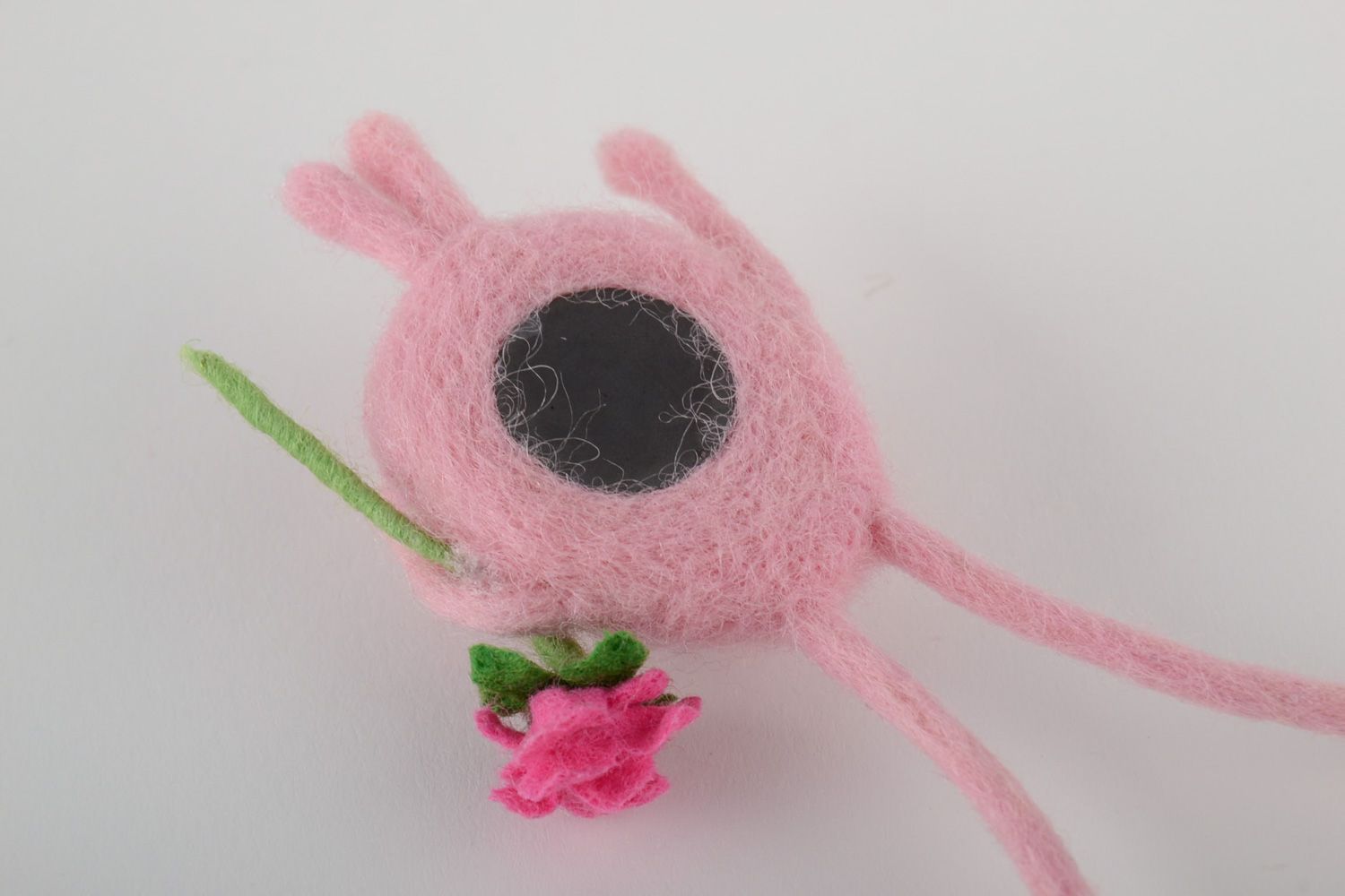 Handmade fridge magnet felted of natural wool touching pink creature with flower photo 3