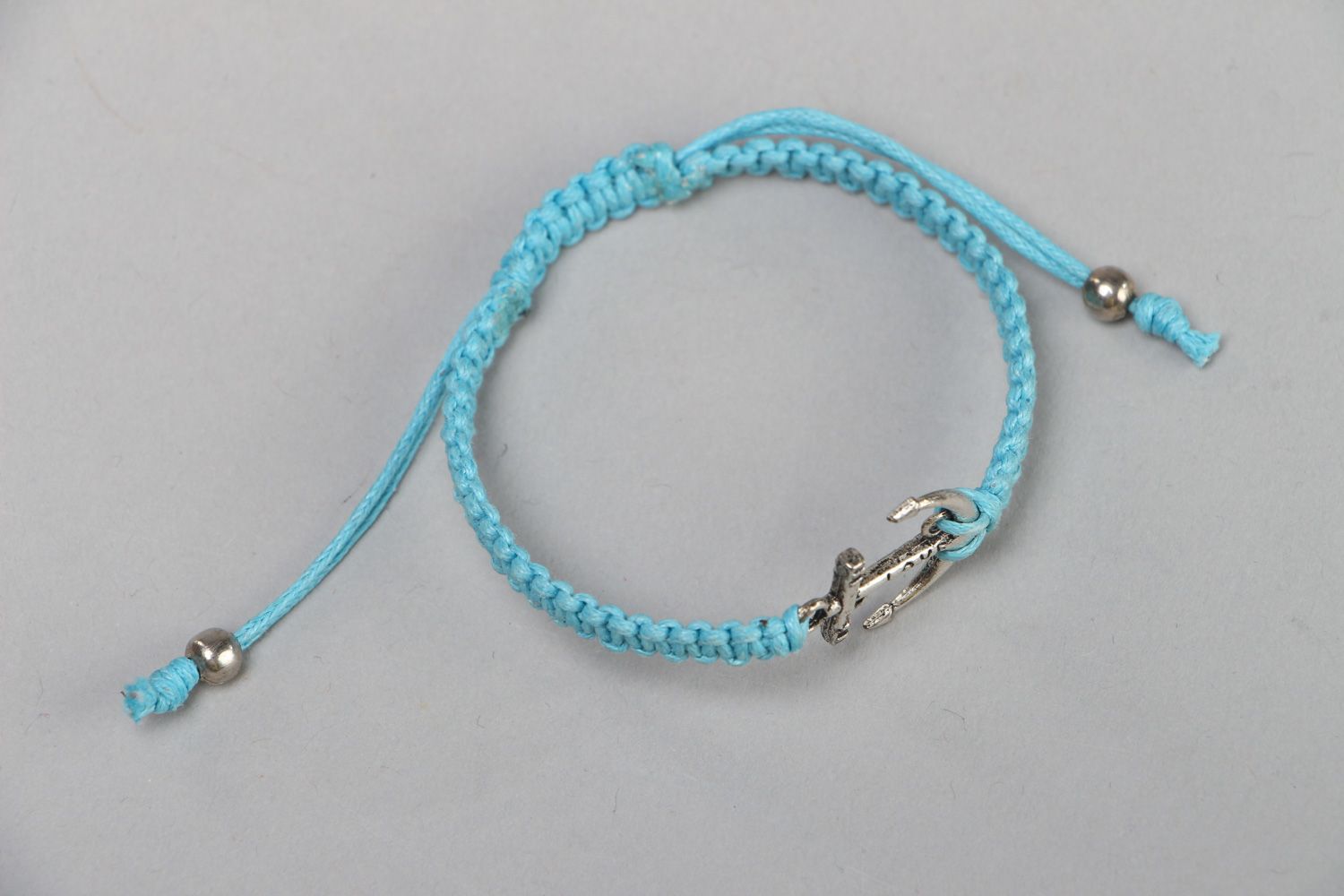Handmade waxed cord wrist bracelet of blue color with metal charm Anchor for women photo 2