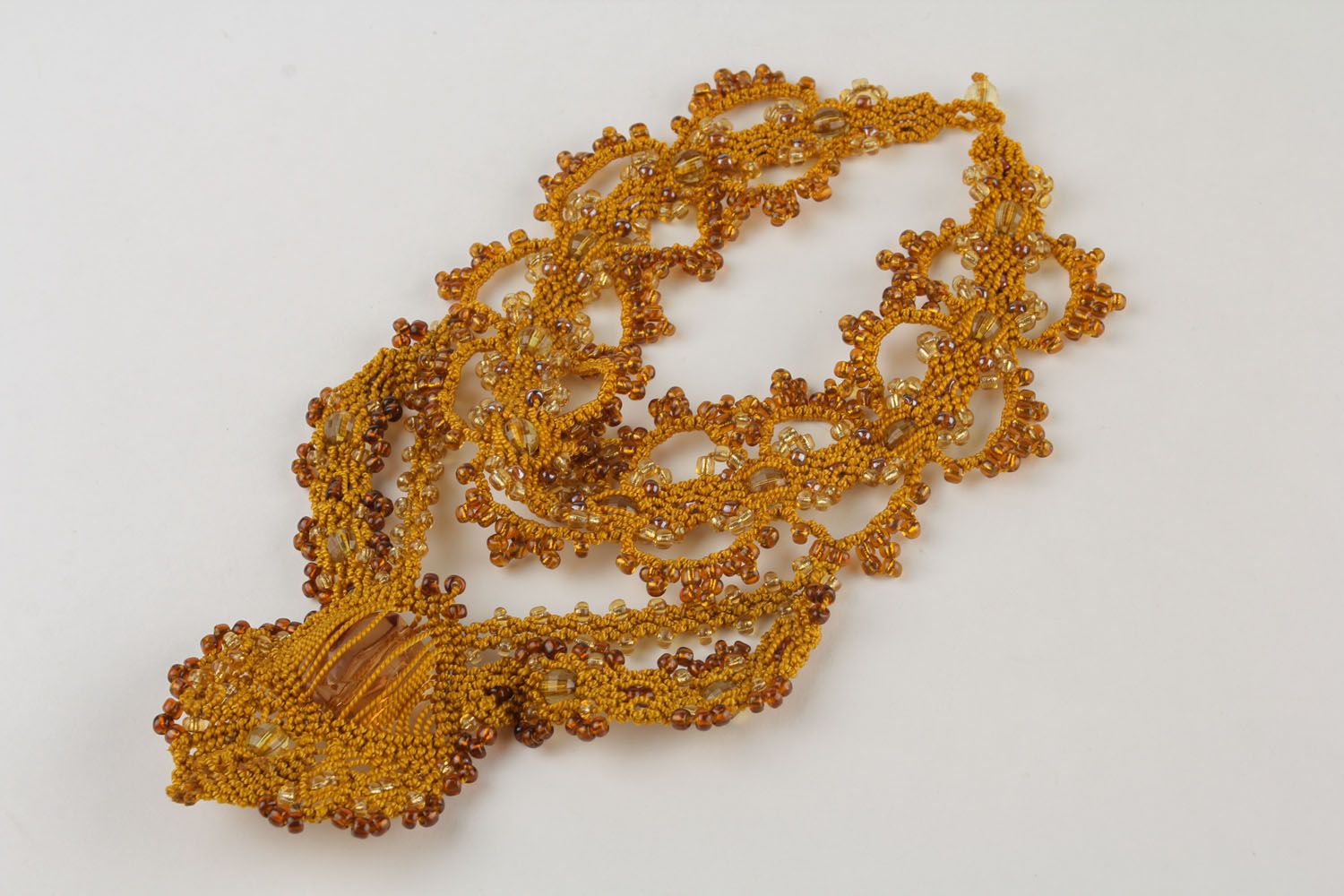 Beaded necklace made of threads photo 5