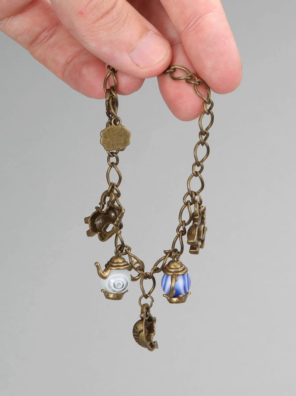 Bracelet with pendants made of bronze photo 3