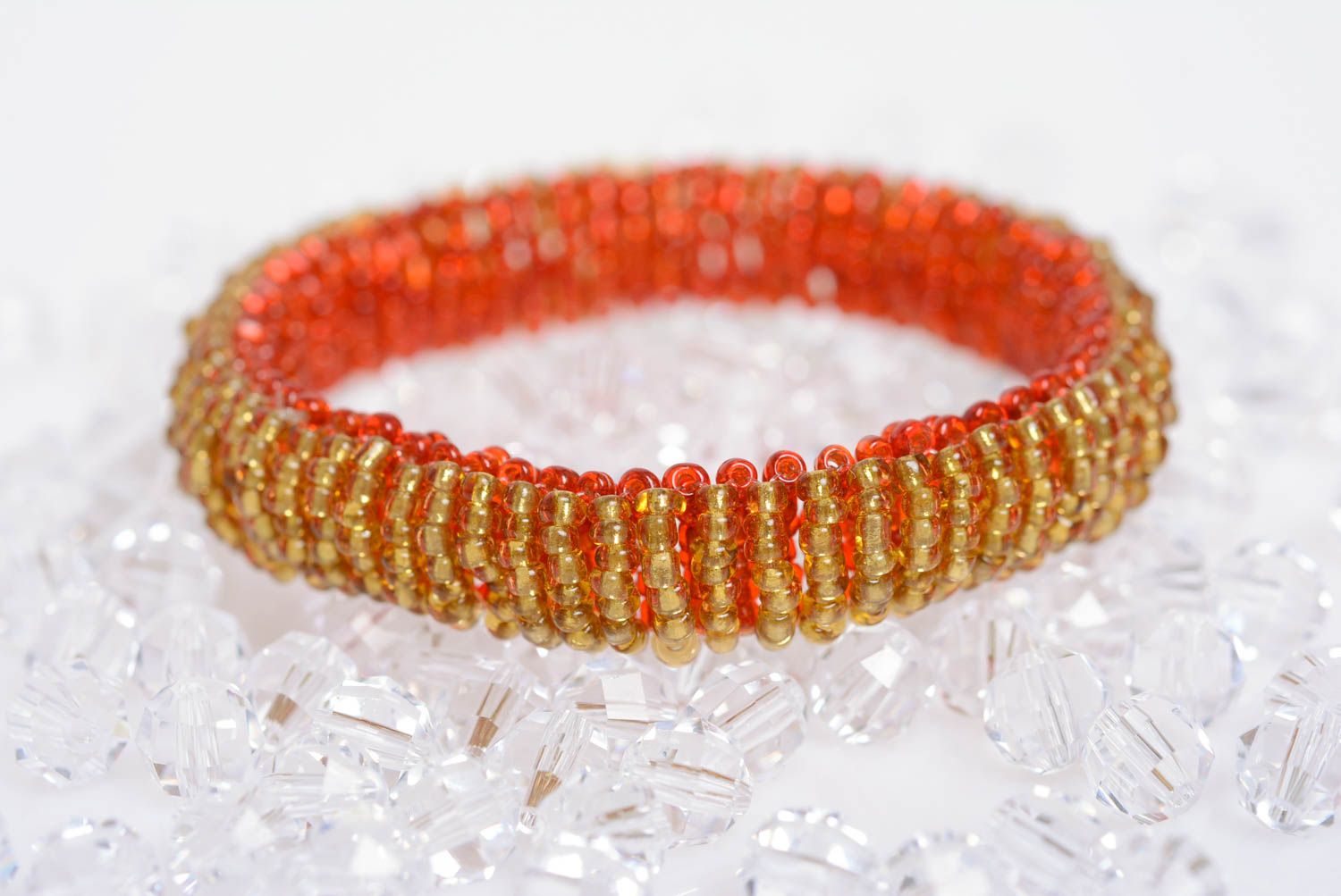 Gold and red beads bracelet on an elastic band for young girls photo 1