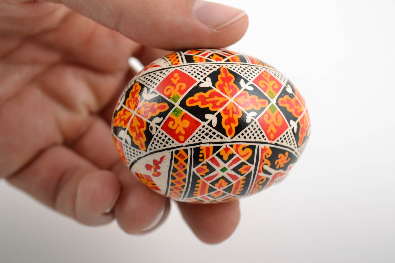 Beautiful handmade painted Easter egg with colorful ornament photo 2