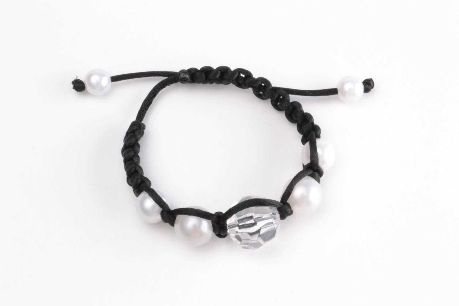 Braided bracelet with white beads photo 5