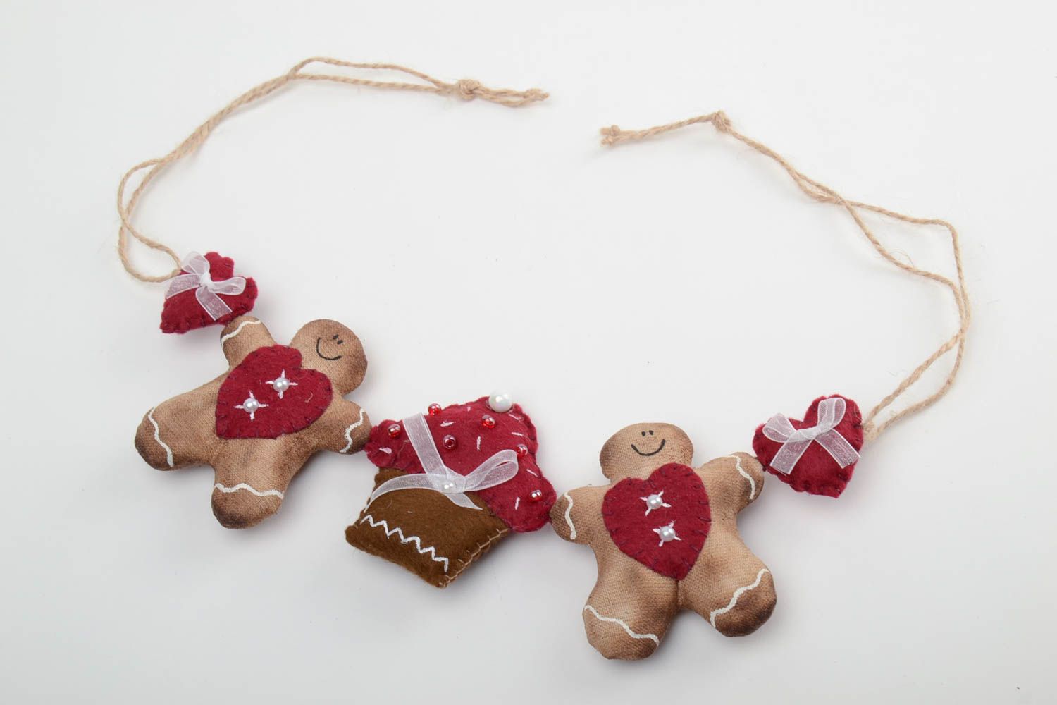 Unusual fabric soft garland in the shape of gingerbread little men with coffee aroma photo 2
