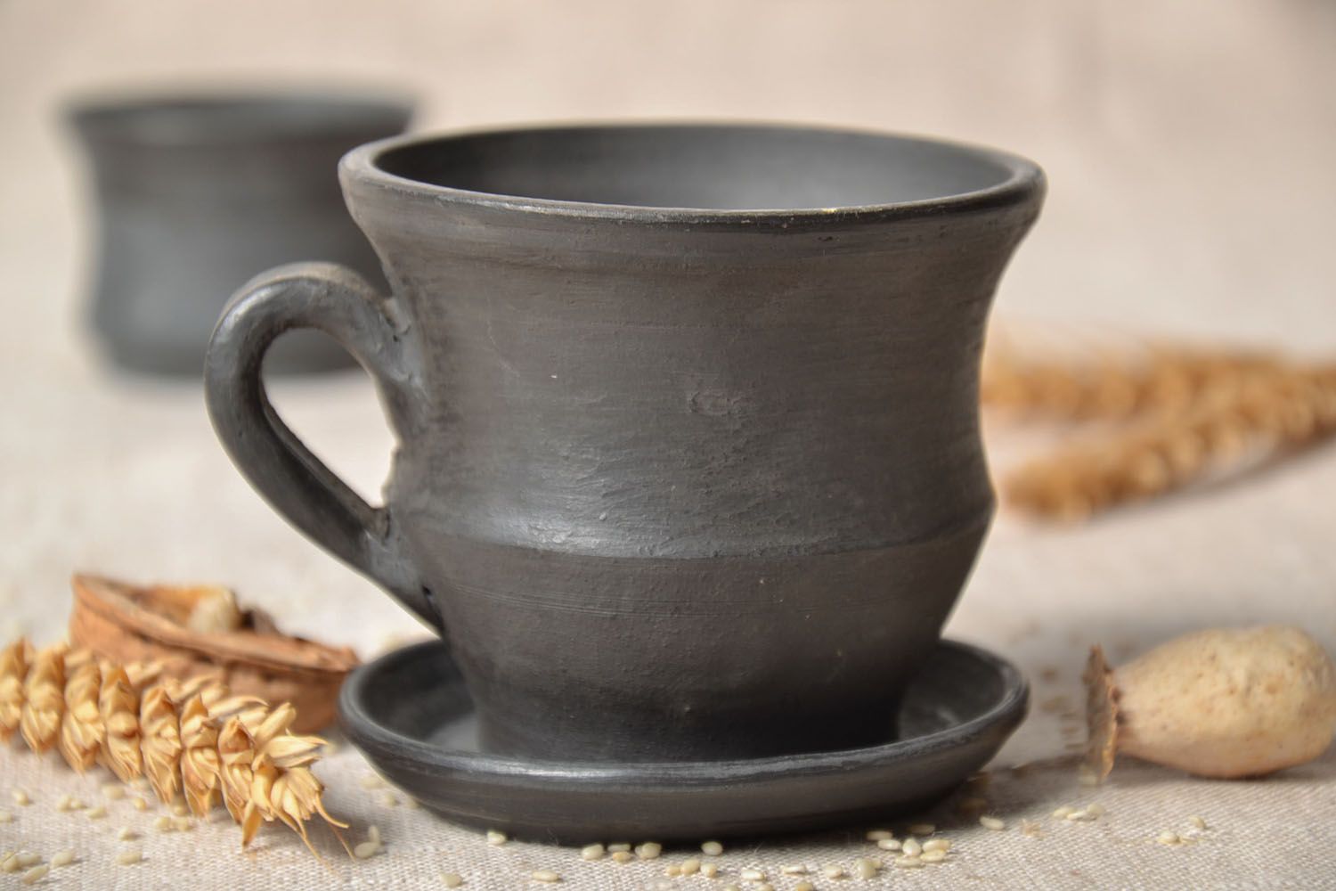 Black clay not glazed coffee cup with handle and saucer photo 1