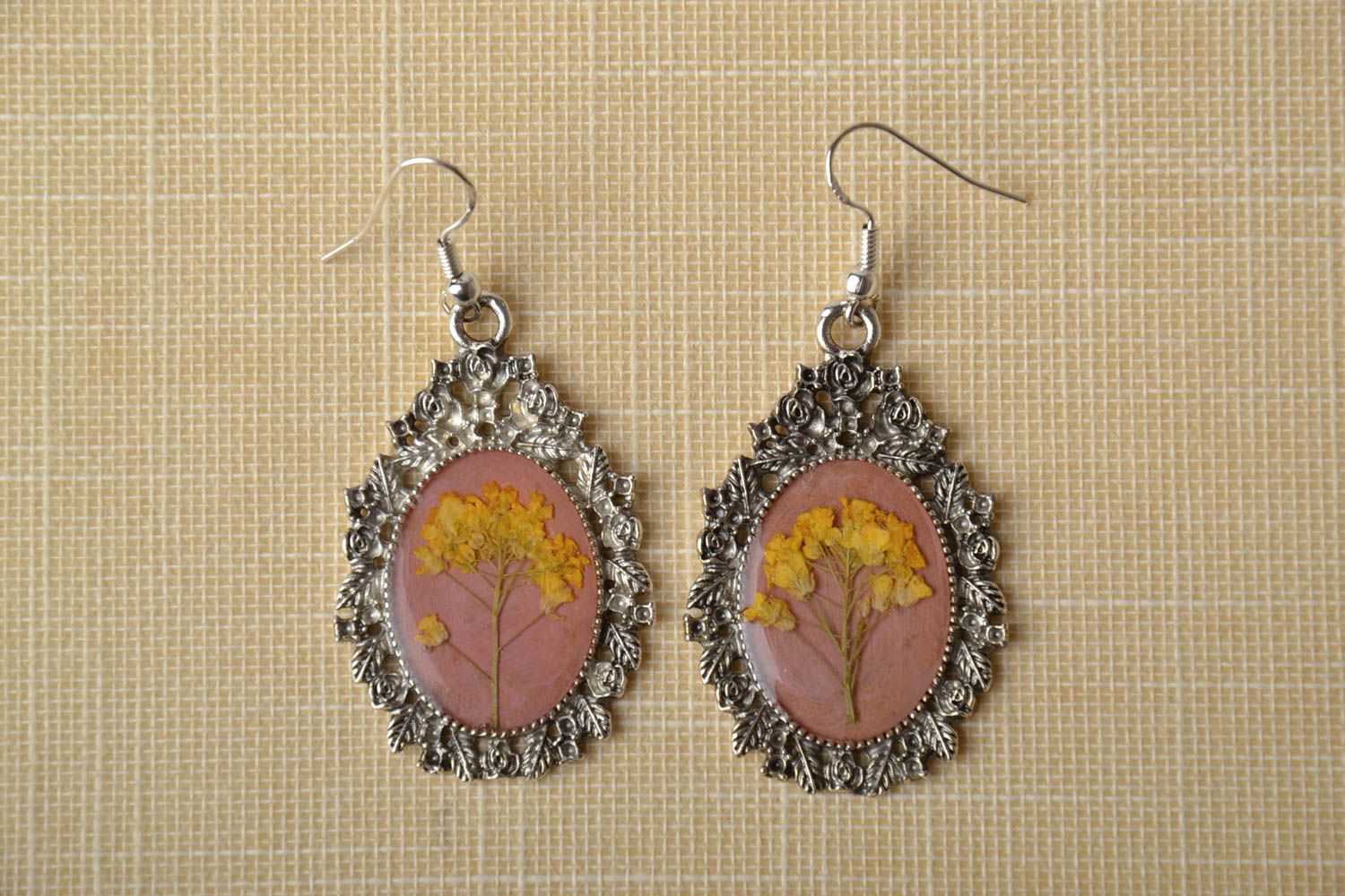 Earrings with natural flowers in epoxy resin photo 1