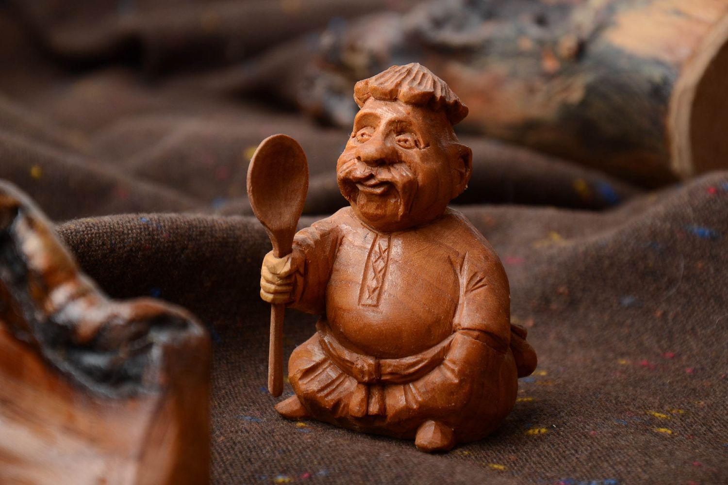 Petite statuette en bois sculptée Cosaque avec cuillère photo 1