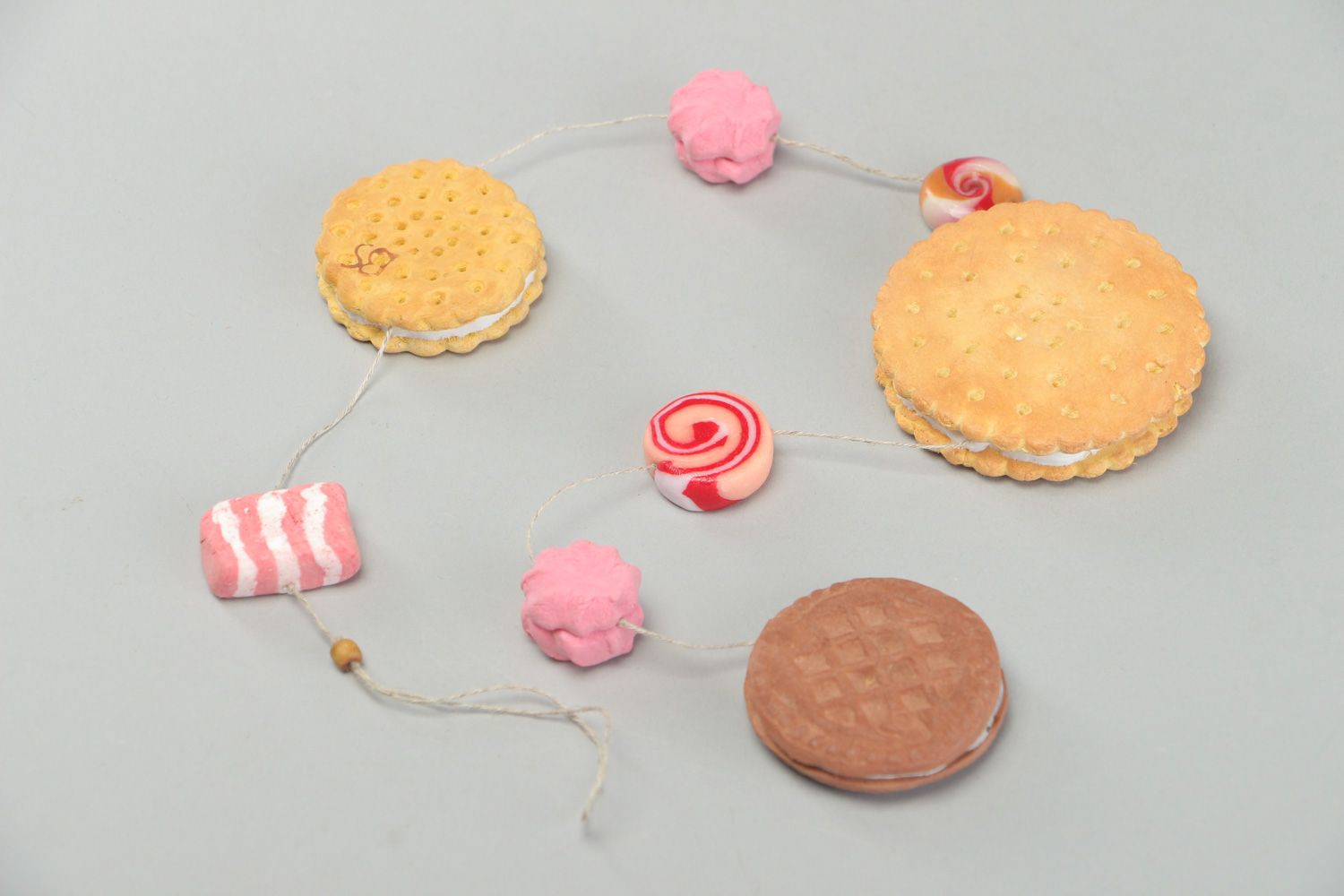 Handmade interior garland with plastic elements Cookies children's party decor photo 1