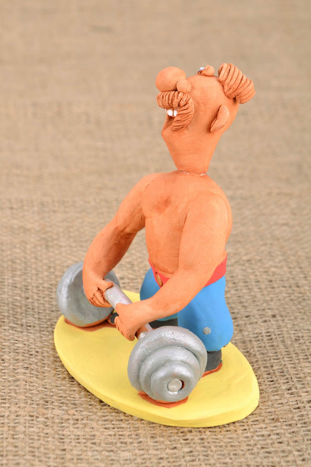 Handmade clay figurine Weightlifter photo 1