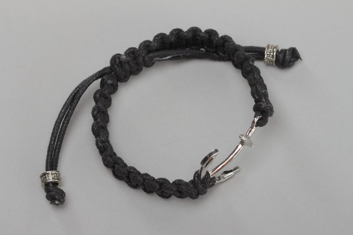 Handmade designer friendship bracelet woven of waxed cord with anchor charm unisex photo 2