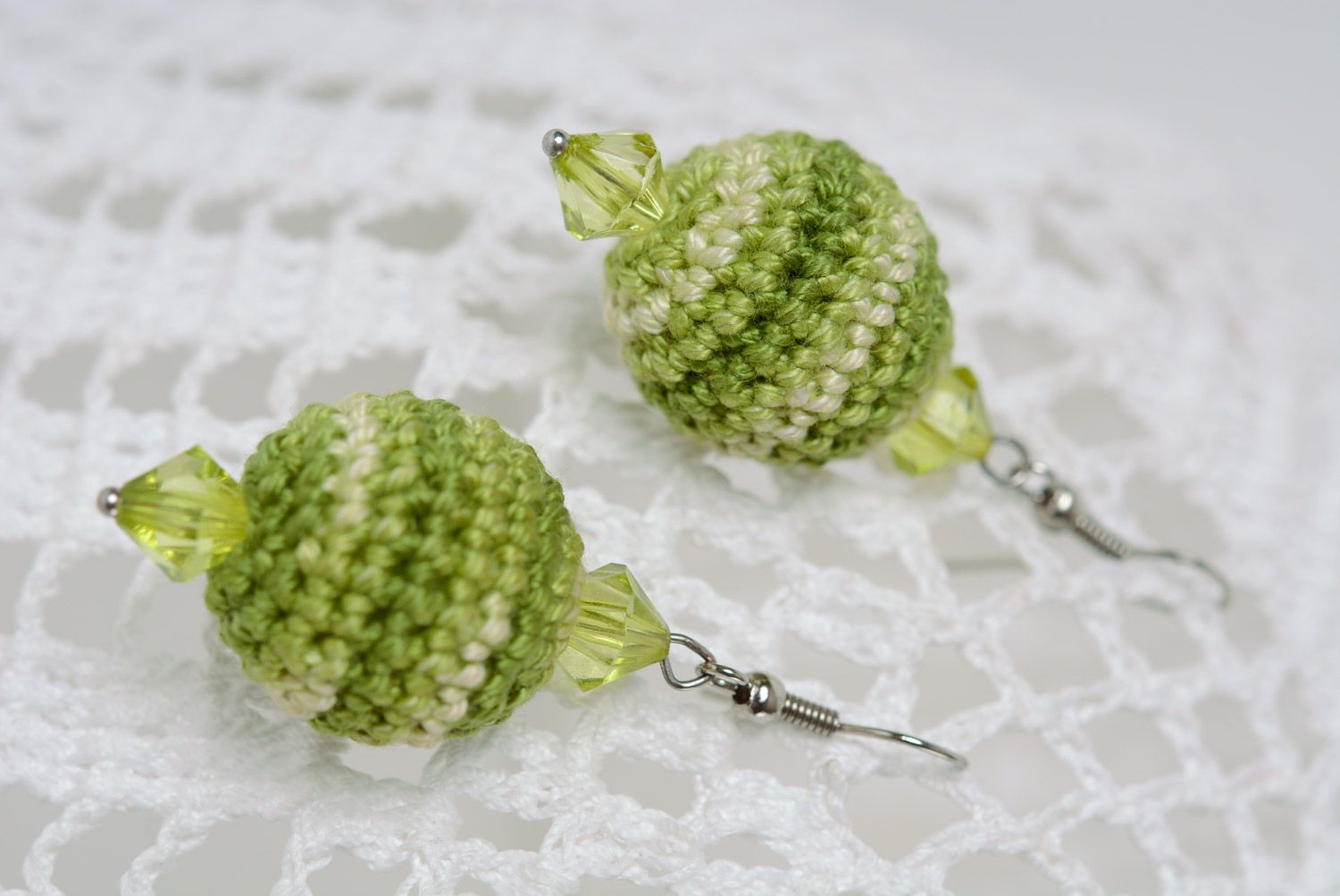Handmade dangle earrings crocheted over with cotton threads in green color palette photo 1