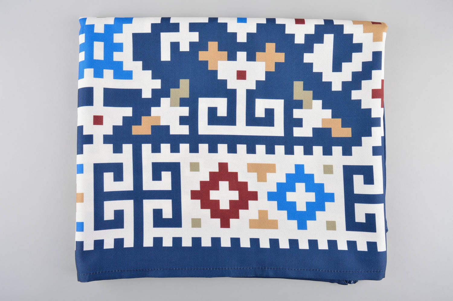 Mantel artesanal azul con ornametos elemento decorativo utensilio de cocina foto 1