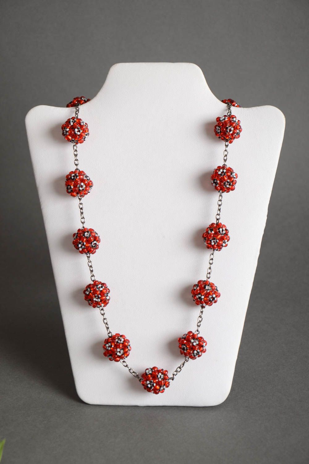 Handmade designer women's necklace on metal chain with red bead woven balls  photo 2