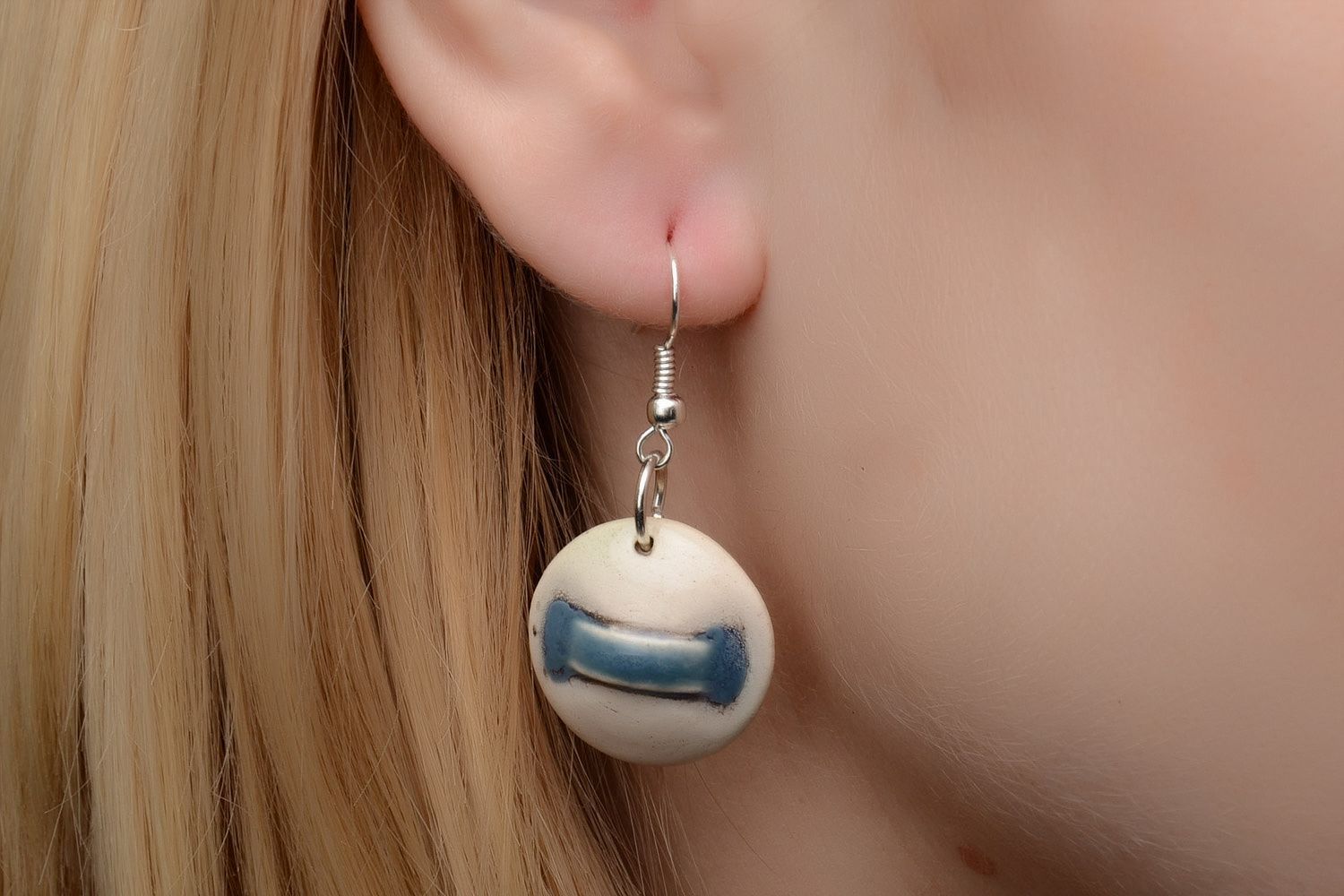 Handmade laconic beige round dangle ceramic earrings painted with enamels photo 2