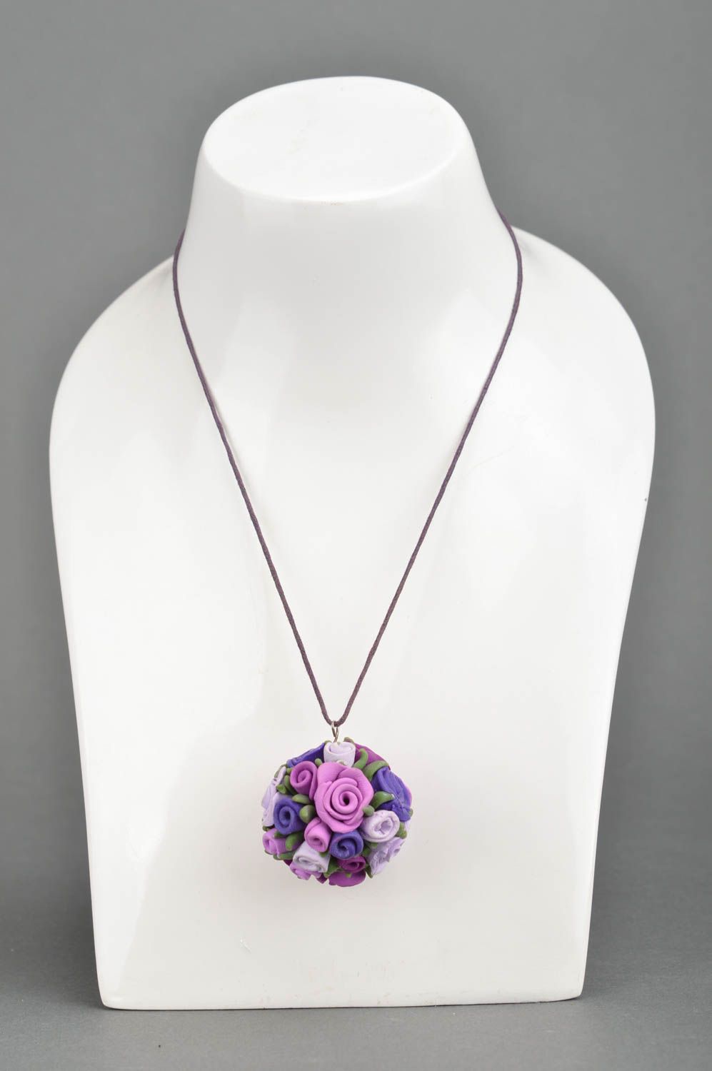 Handmade pendant made of polymer clay in form of purple flowers on cord photo 5
