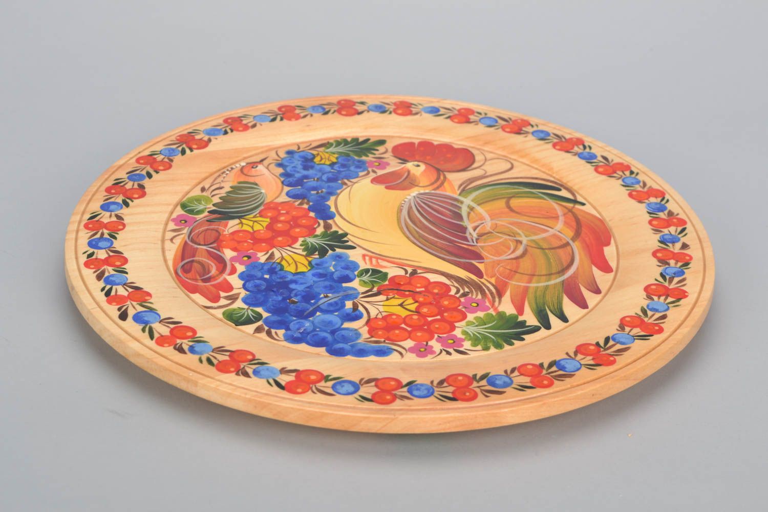 Decorative plate with Petrikivka painting photo 3