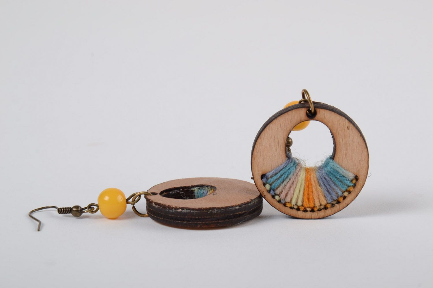 Handmade round plywood earrings with yellow and blue embroidery and beads photo 4