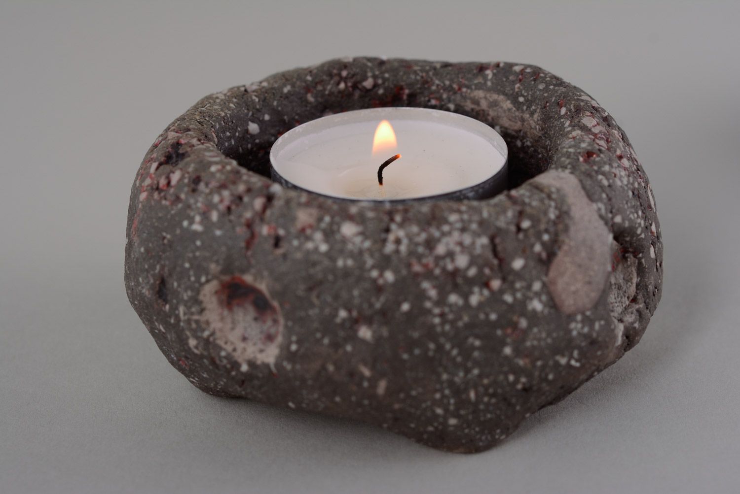 Handmade small dark clay candle holder in the shape of stone for one table candle photo 2
