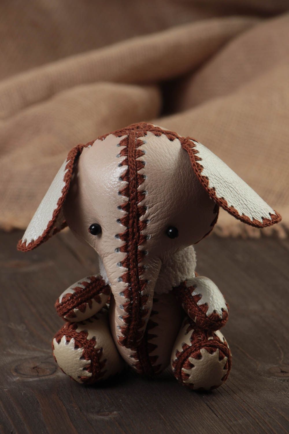 Handmade small beige leather soft toy elephant stitched with brown threads photo 1