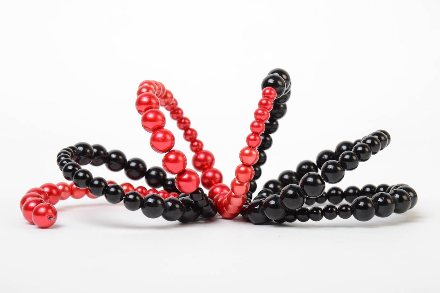Red and black handmade designer wrist bracelet woven of plastic beads photo 4