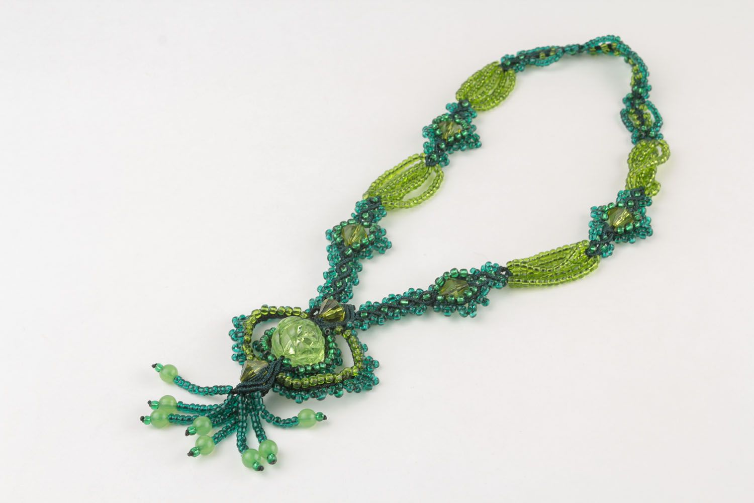 Homemade necklace woven of beads and threads photo 3
