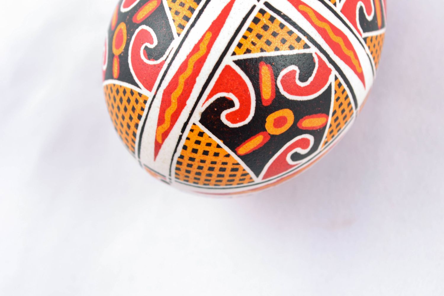 Handmade Easter egg painted with solar symbols photo 5