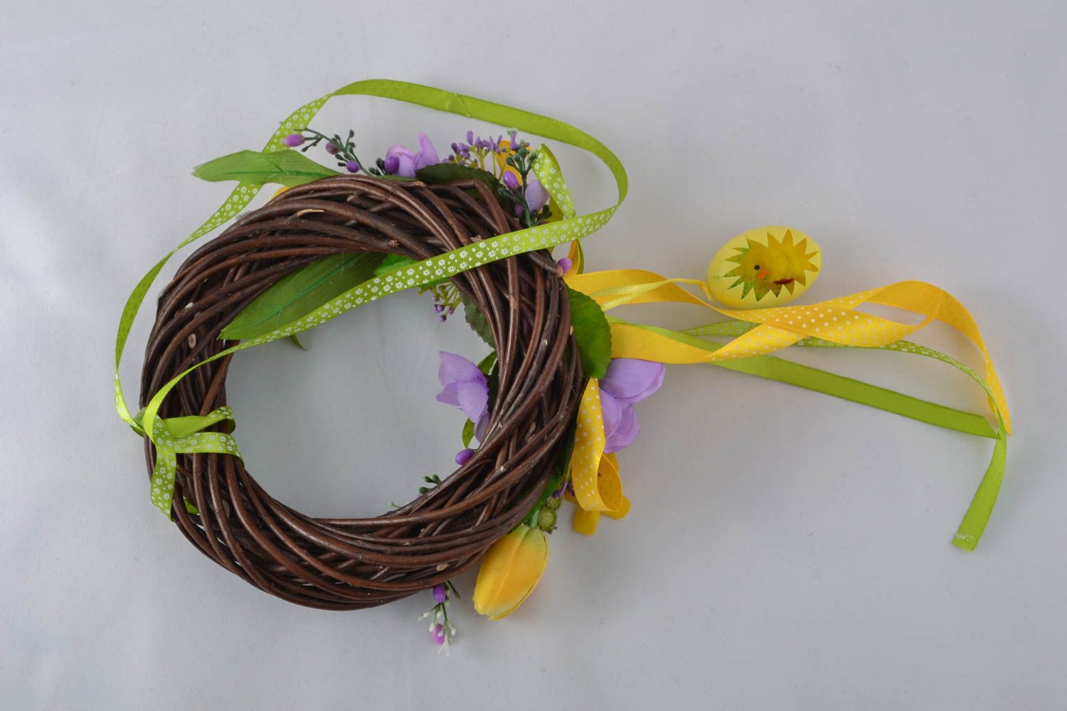 Easter willow wreath with artificial flowers photo 3