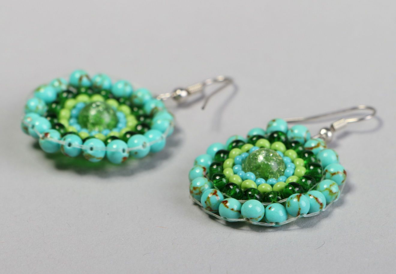 Round earrings with beads and turquoise photo 1